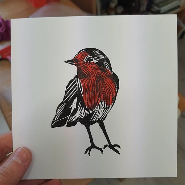 lino print of a bird
