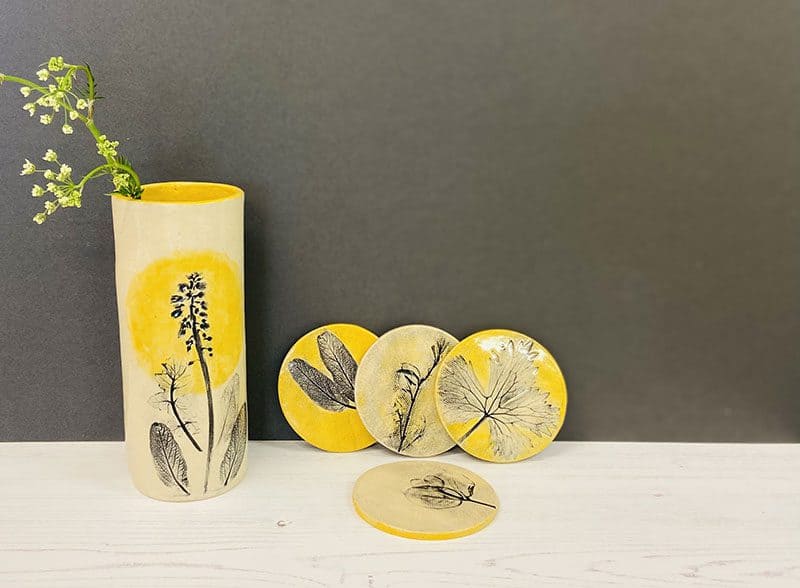 yellow botanical vase
