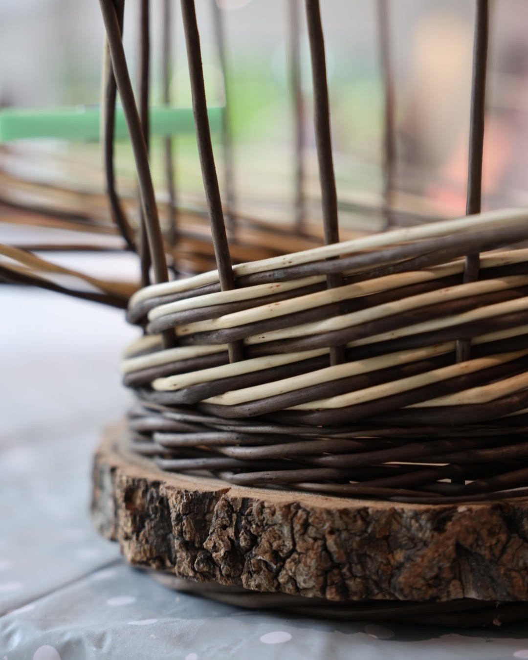 The process of weaving a basket with a log base